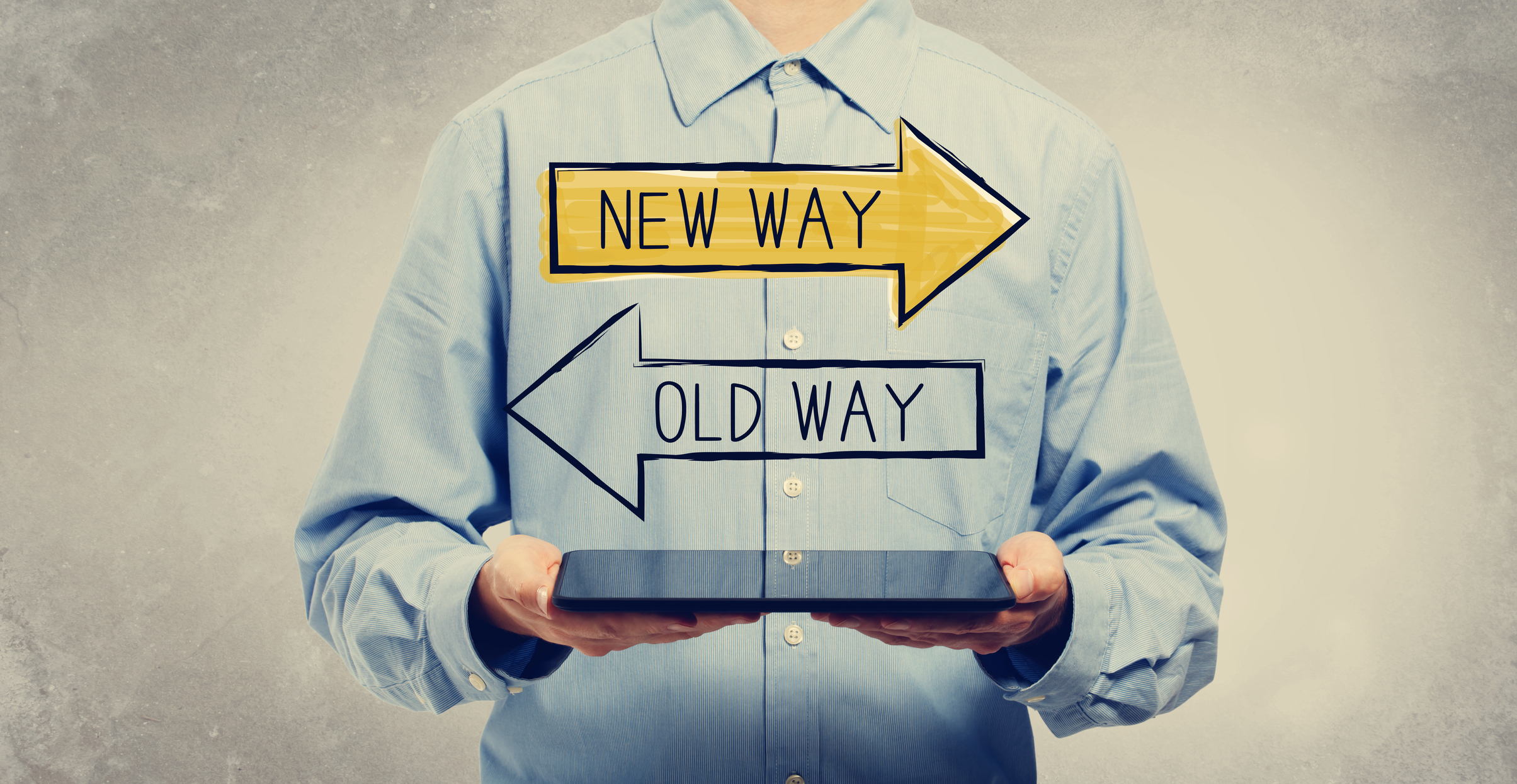 Graphic of a man in a blue shirt holding a computer-generated sign with two arrows that say “new way” and “old way” referencing the divide between sales and marketing cultures.