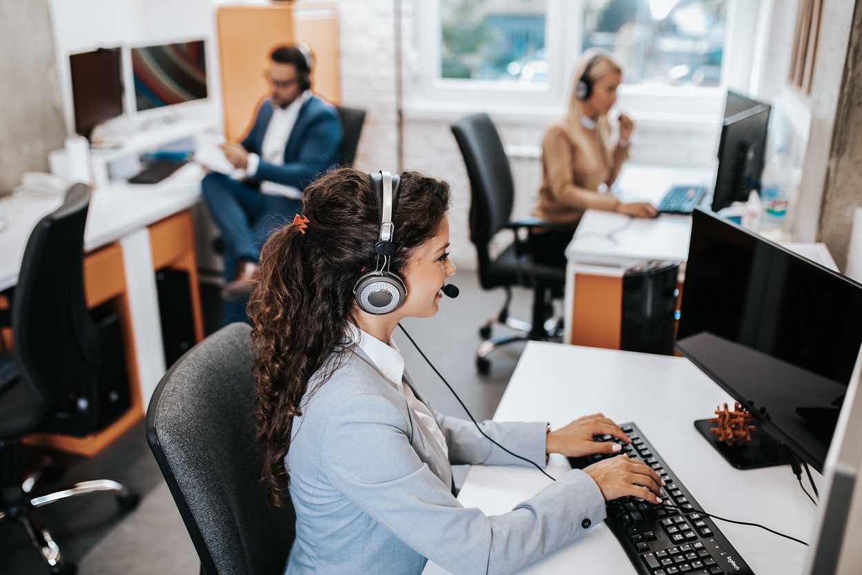 customer centirc call center employees working together on office