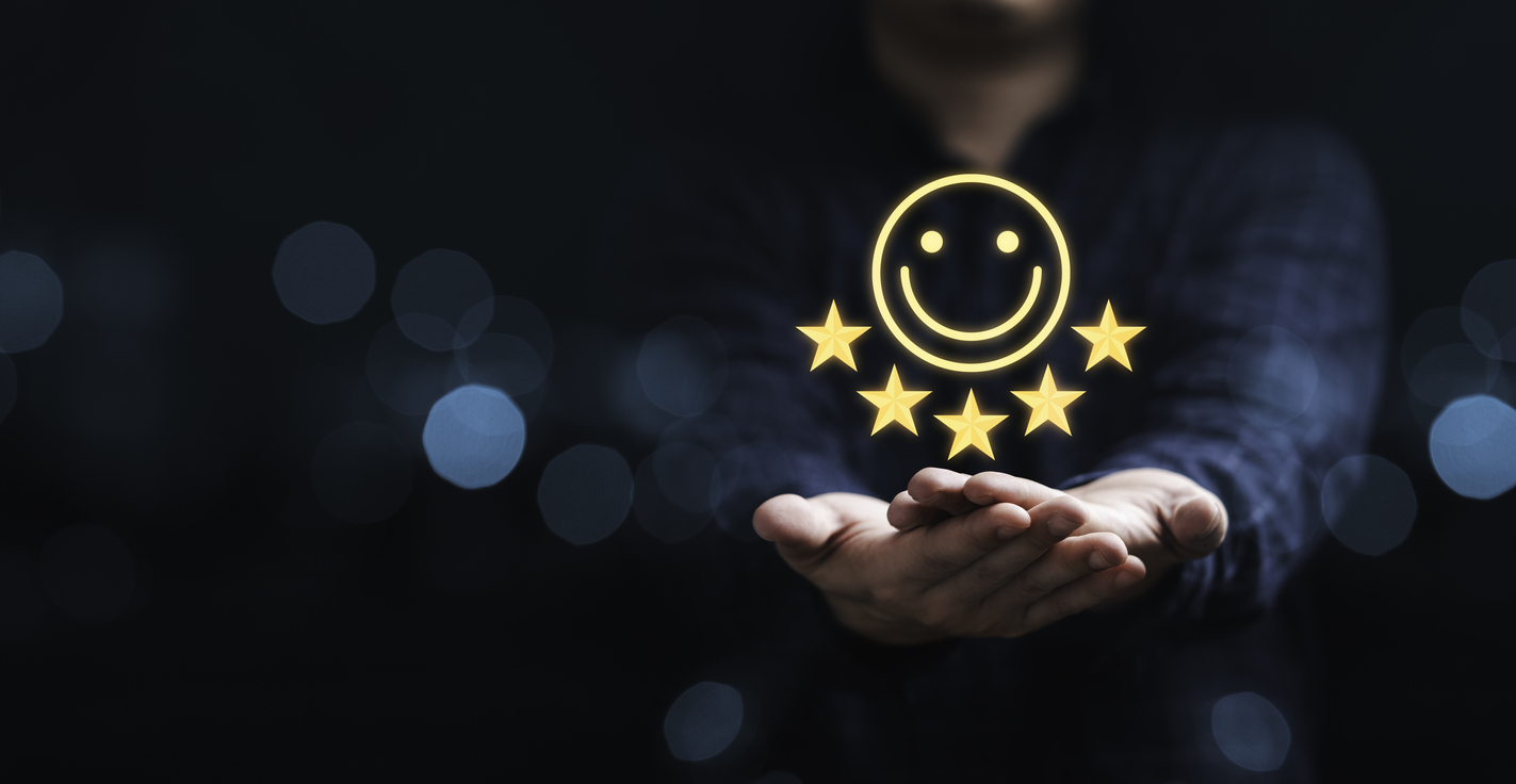 A pair of hands holds a superimposed five-star review symbol, indicating a satisfied customer whose expectations were met.