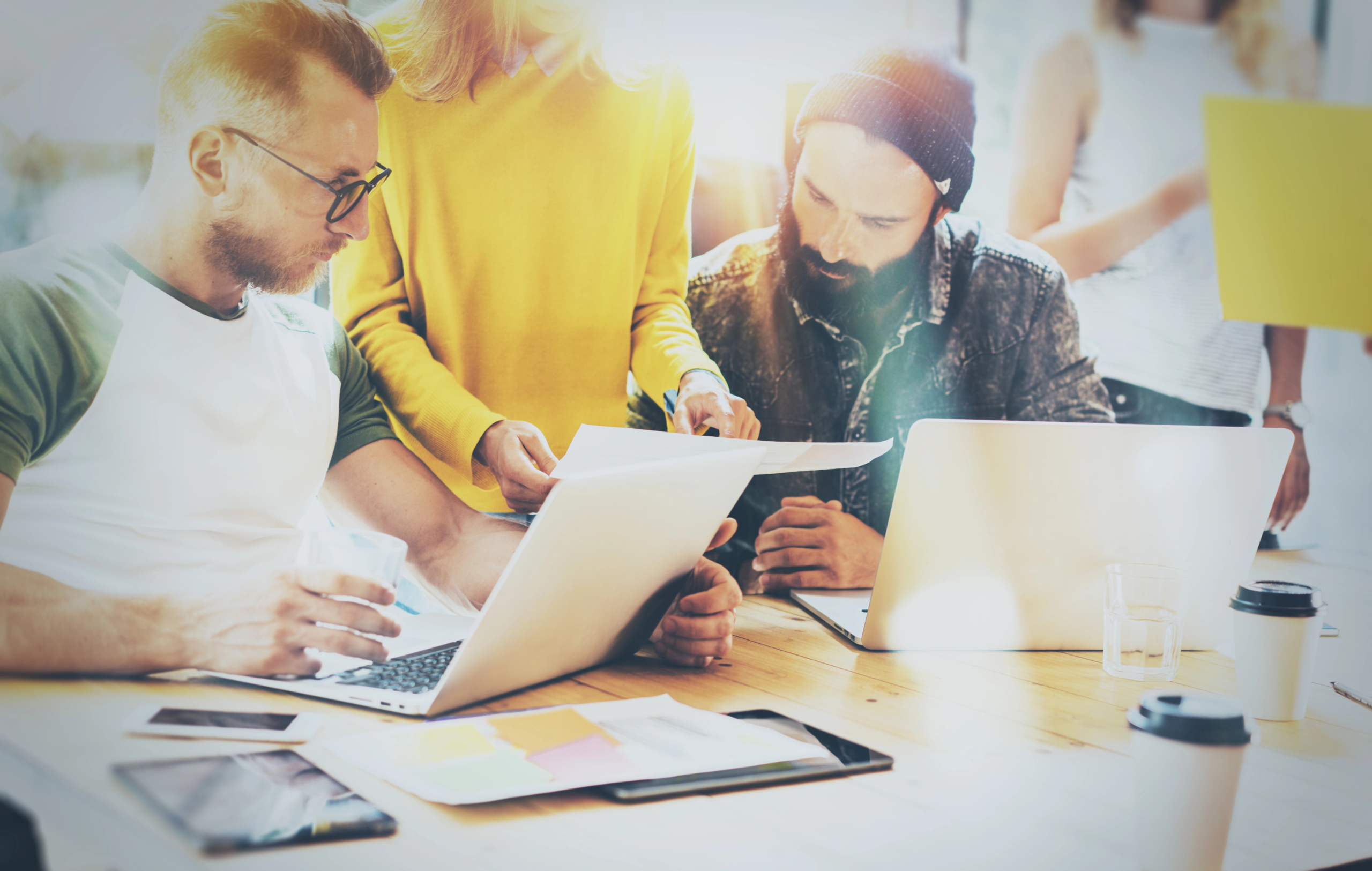 Marketing team working together to analyze customer data insights