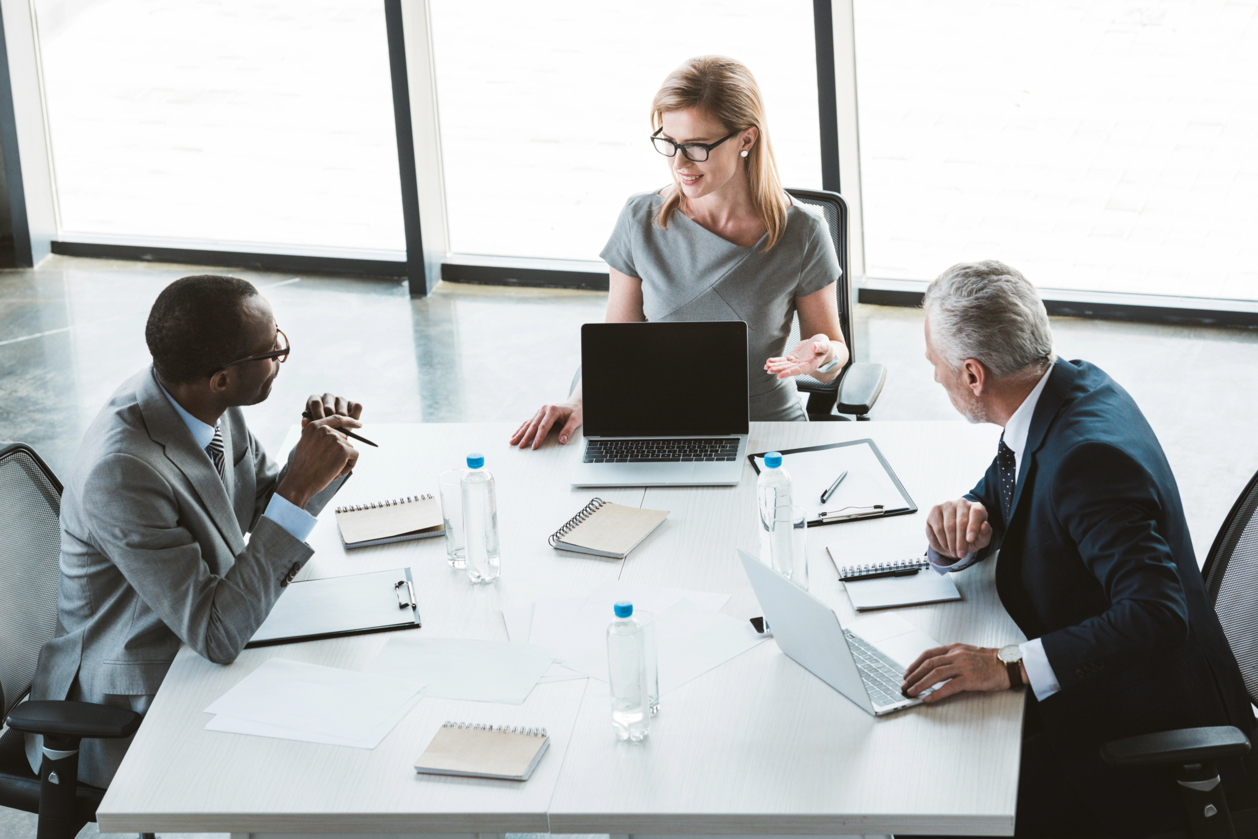 business team reviews results after using AI sales enablement to provide reps with real-time insights