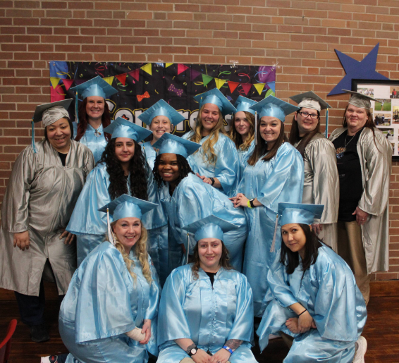 Televerde Foundation graduates celebrating achievement in cap and gown, symbolizing second chances, workforce development, and empowerment through education and career readiness